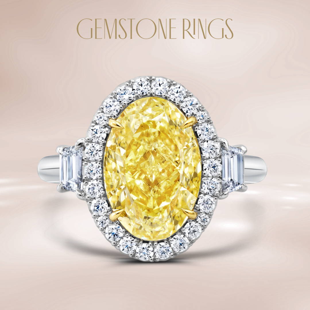 Oval shaped yellow diamond engagement ring