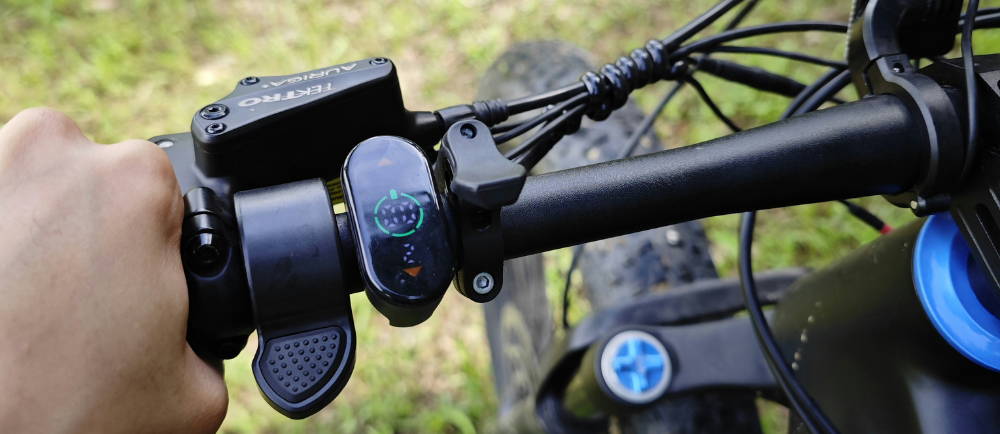 Close up of electric bike throttle on handlebars