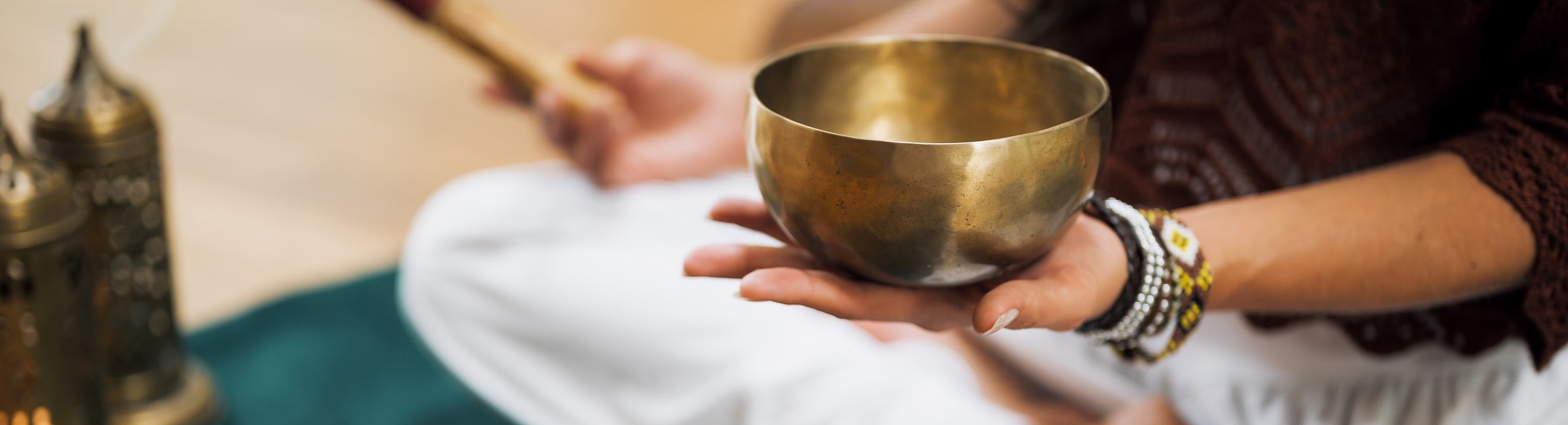 Yogi holding a gong