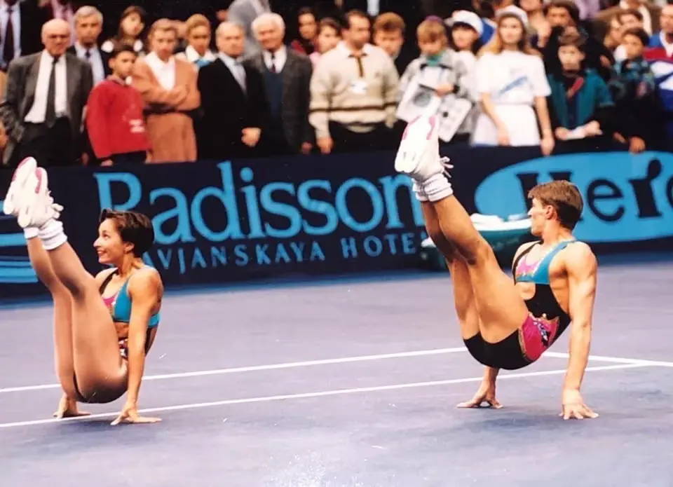 Photo of Olga and her partner at an Aerobics competition