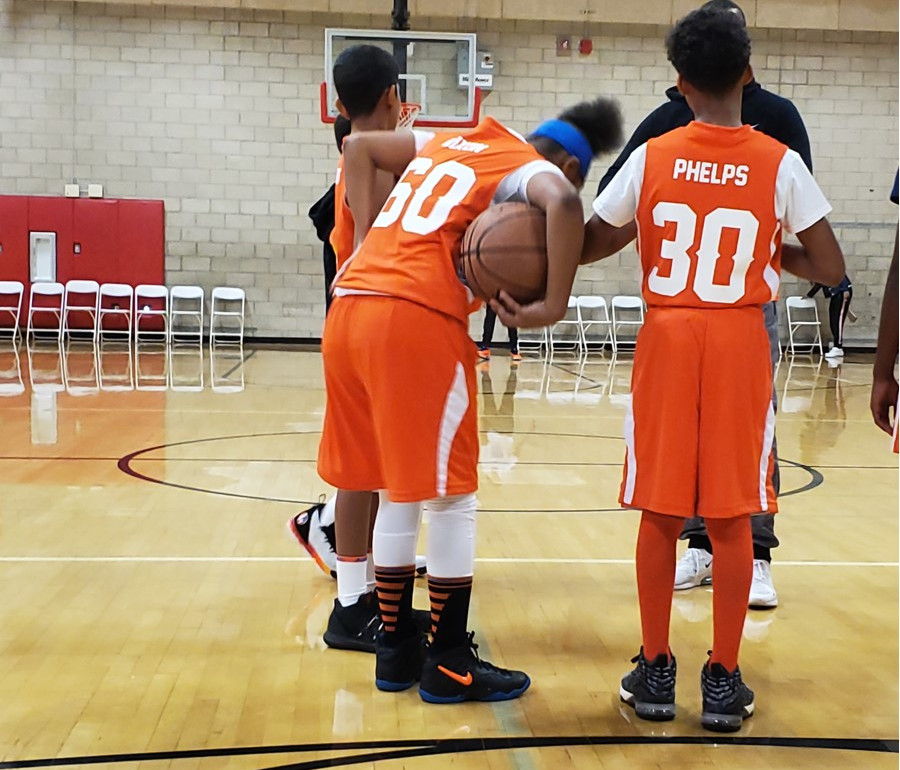 Orange Uniform Basketball Team Photo
