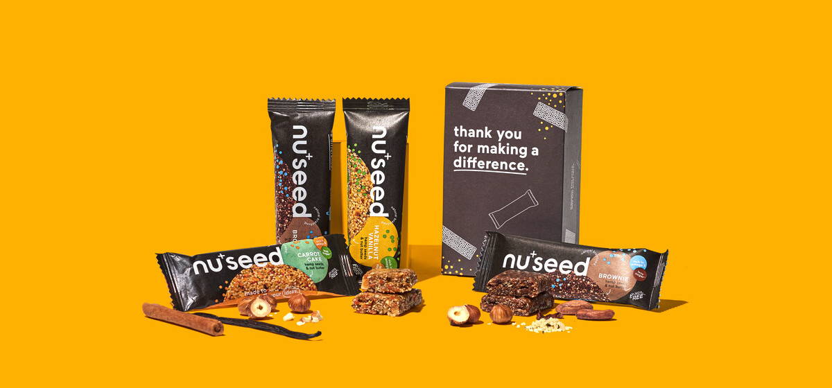 Full range of the nu company products: nucao chocolate, nuseed bar and numove protein bar