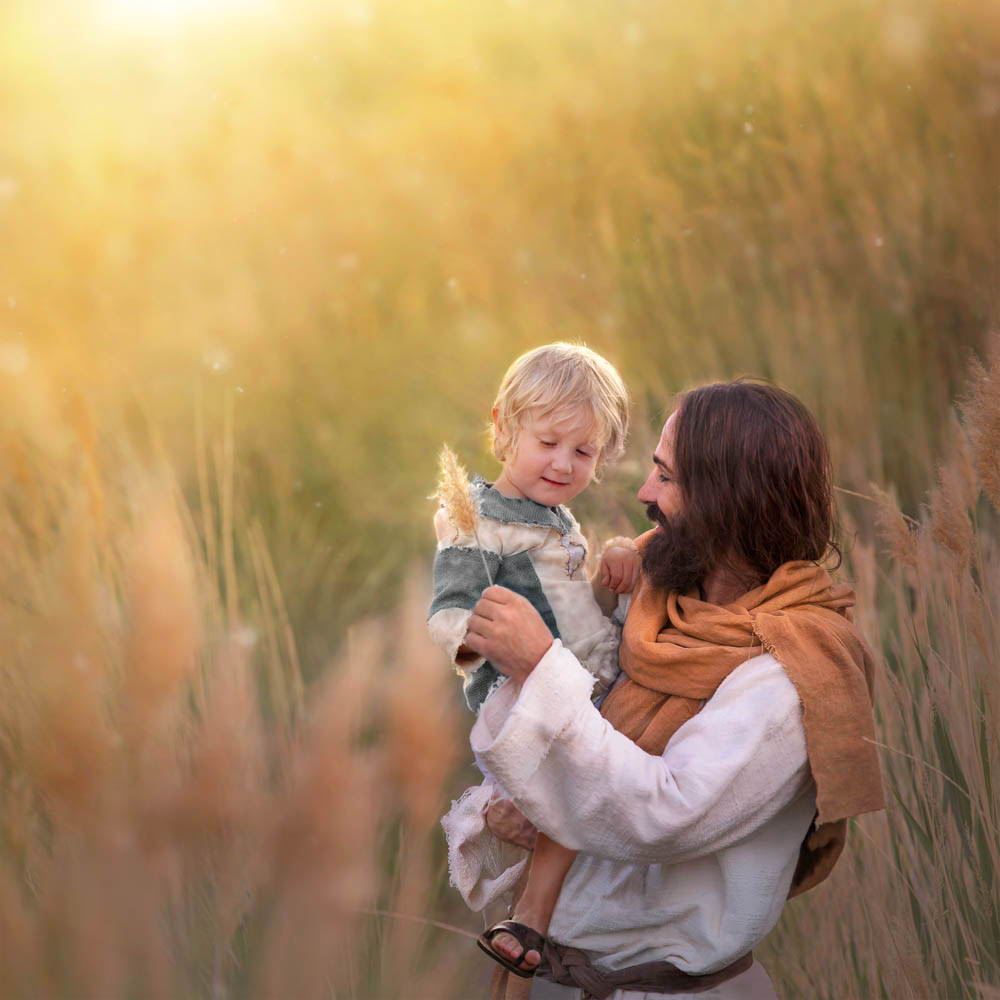 Jesus holding a young child. The child is giving him a strand of wheat.