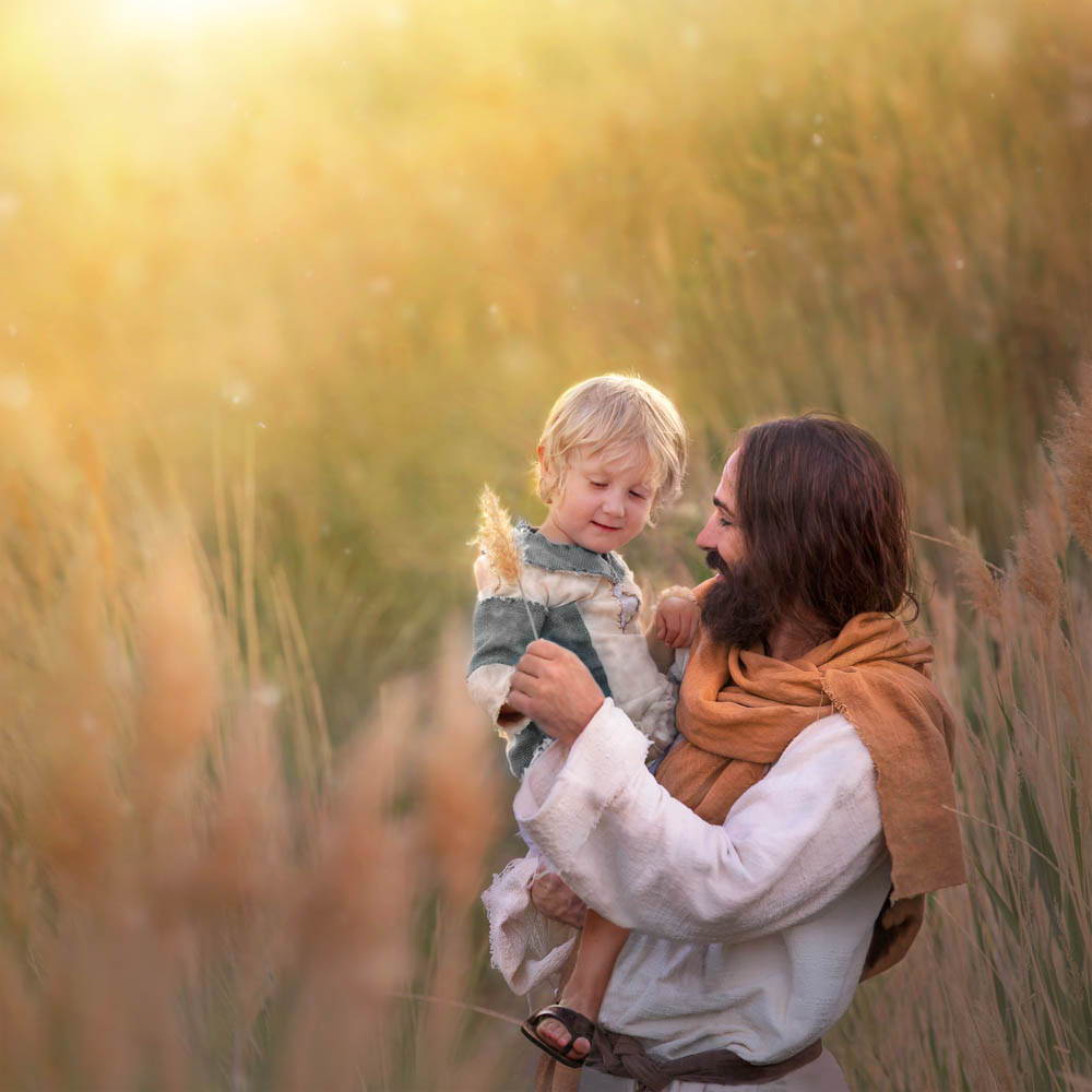 Jesus holding a young child. The child is giving him a strand of wheat.