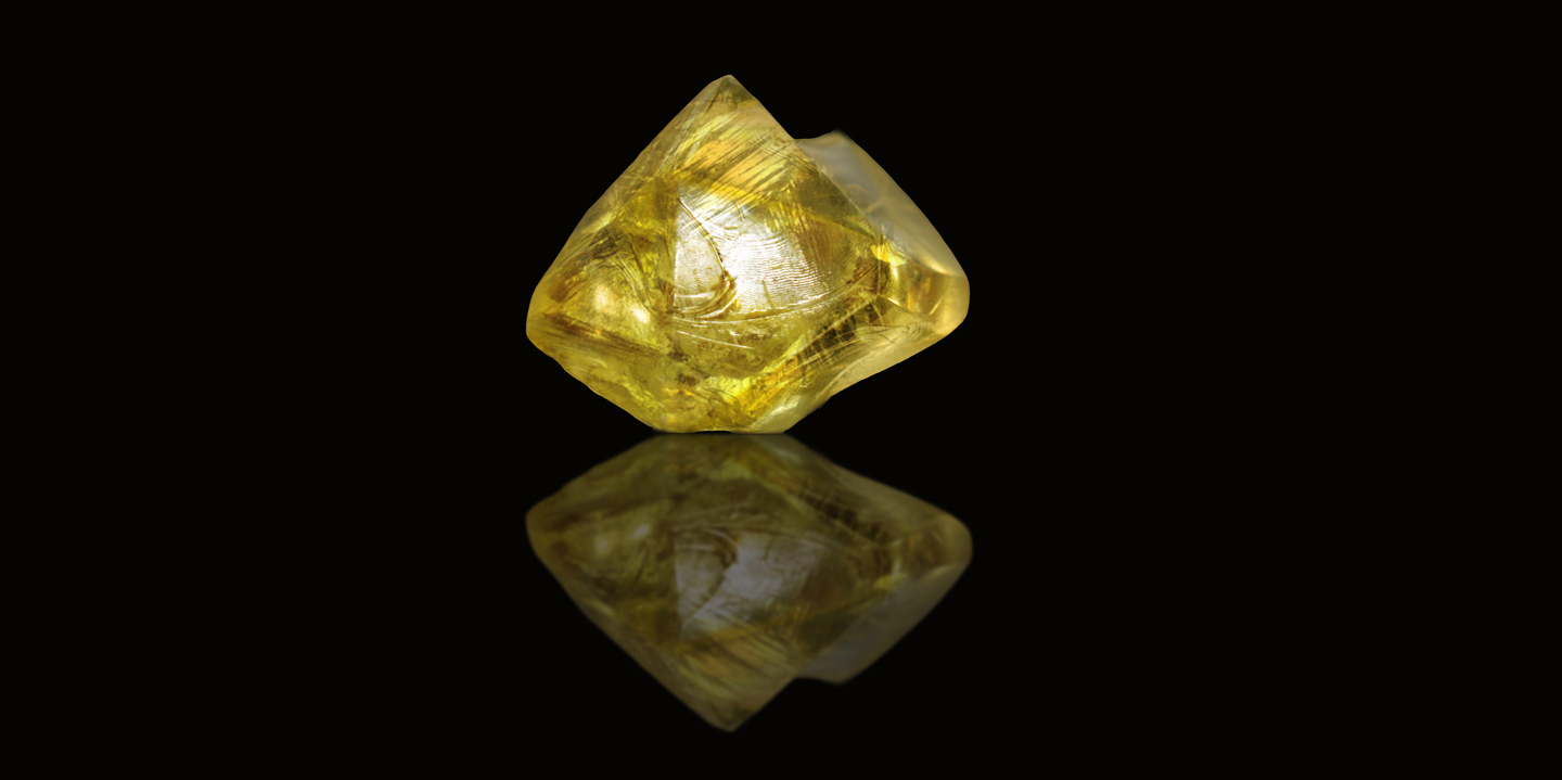 Unpolished natural yellow diamond