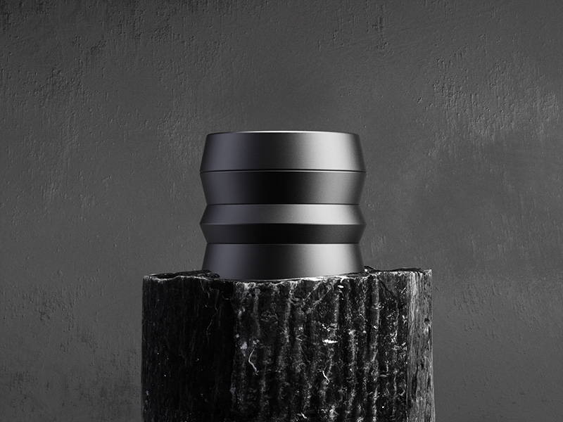 black and white photo of KLIP grinder over wood