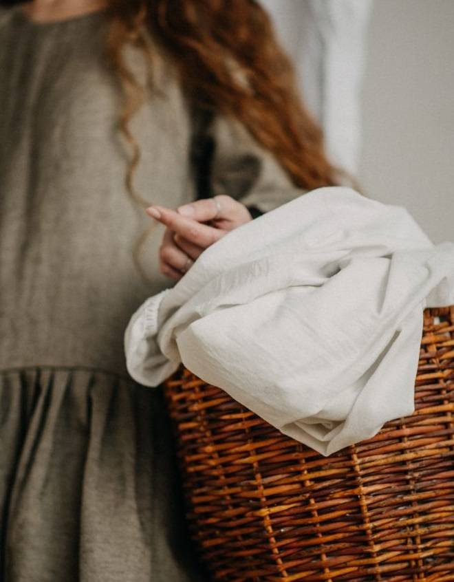linen clothing in the laundry basket