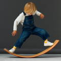 Child standing on a wooden balance board.