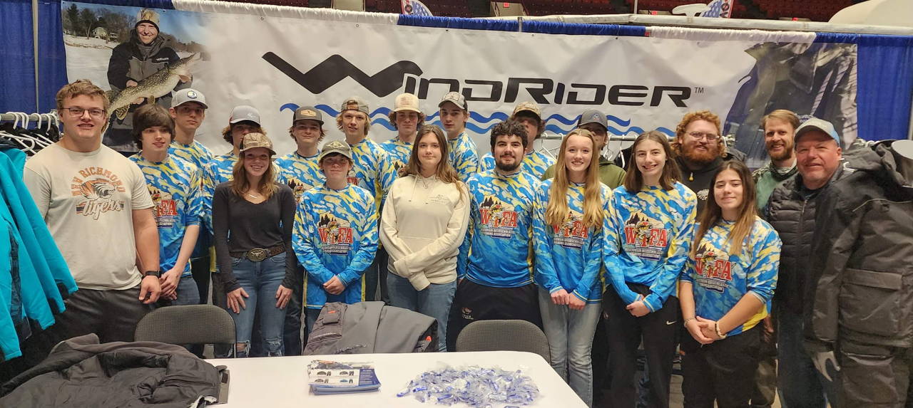 A group of anglers gathered at the WindRider booth