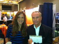 Greg Friedman, president of Junxure with Amy Flourry, operations manager for Rehmann Financial.
