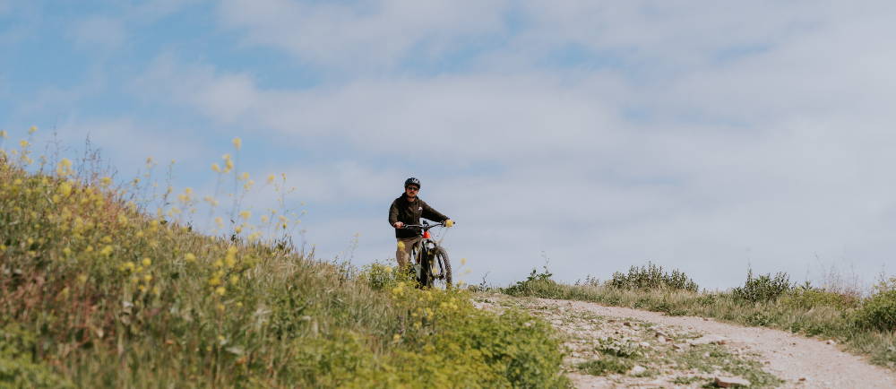 Rider on Cannondale Moterra eMTB on trail