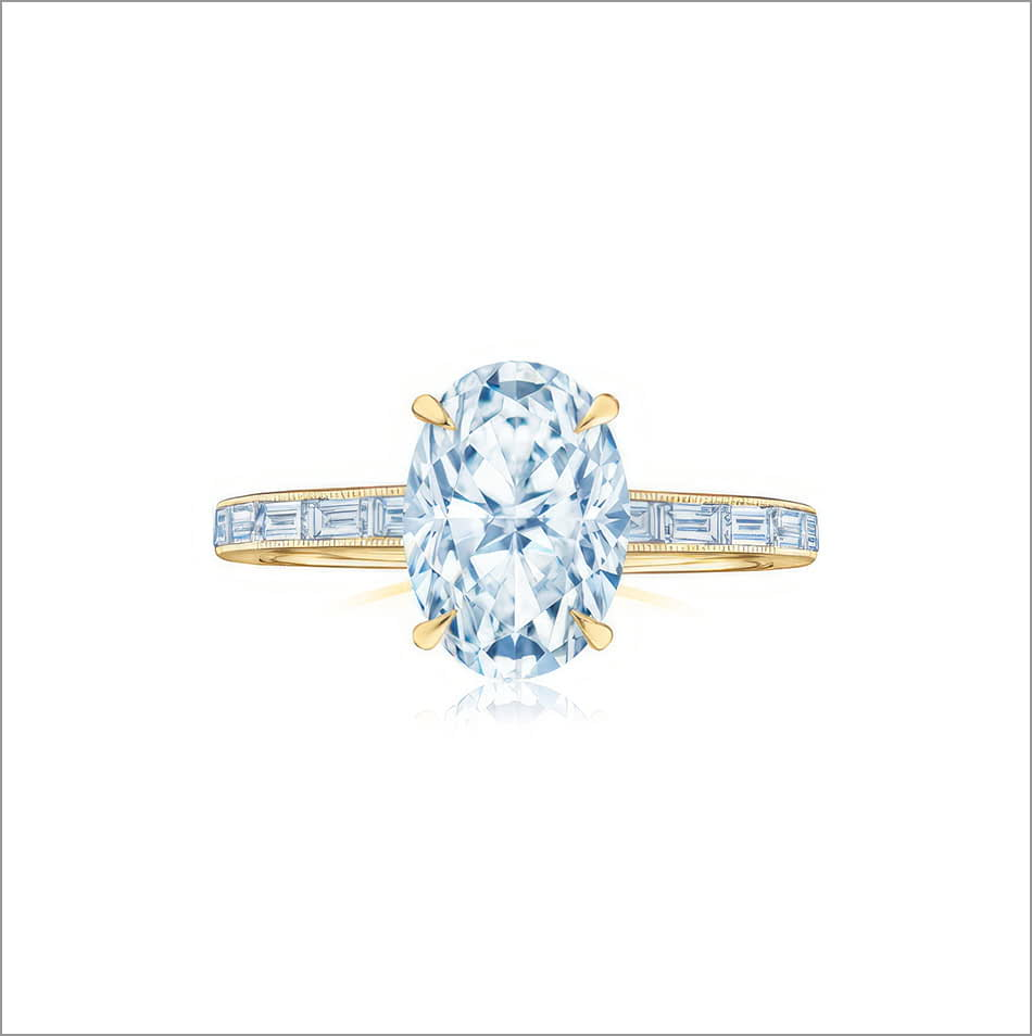 Front view of a Kwiat oval diamond prong set on a yellow gold band with chanel set diamonds. 