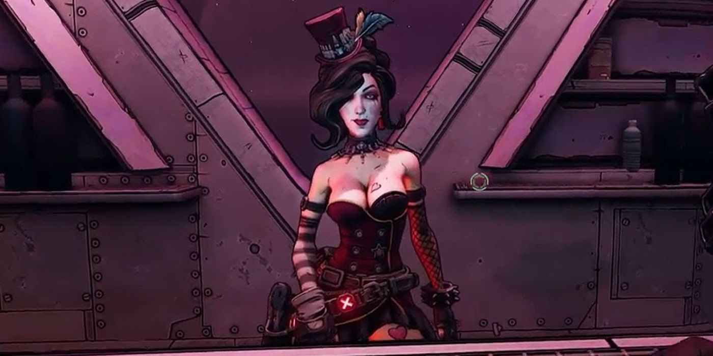 Moxxi standing against an industrial background. She has on a red corset with striped armbands and a top hat. She is looking intently towards the camera.