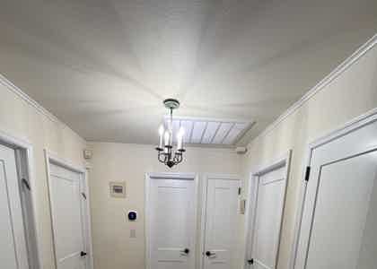 East Meadow NY Home Wows with 12 Nantucket Doors Transformation