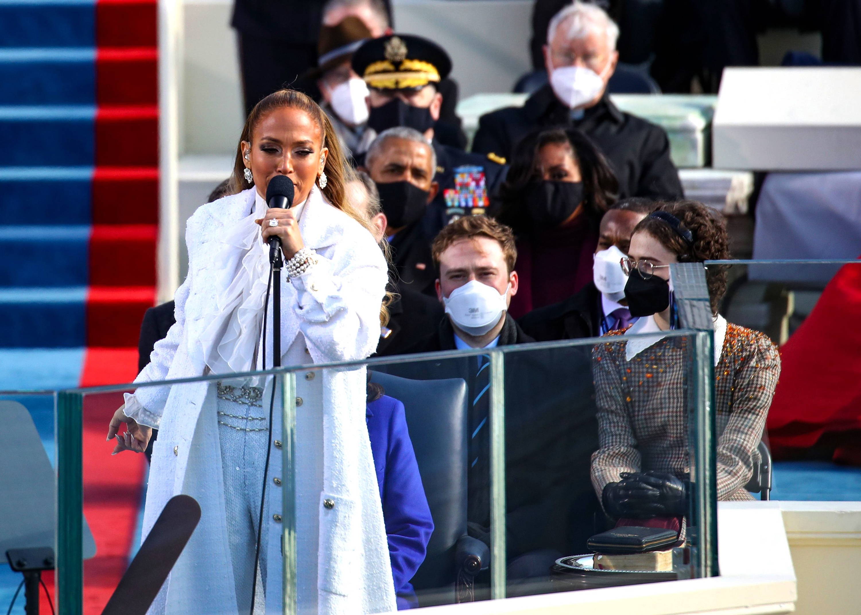 Jennifer Lopez performs at the inauguration ceremony of President Joseph R. Biden wearing a white outfit