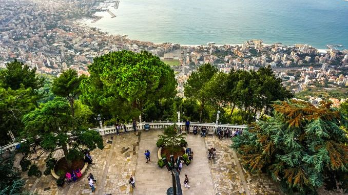 HARISSA, LEBANON - OCTOBER 2017 Our Lady of Lebanon Marian Shrine Pilgrimage Site Viewpoint Jounieh Landscape at Sunset
