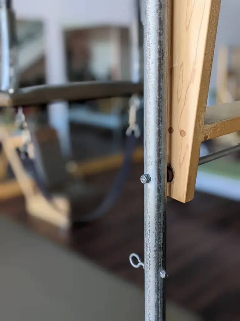 Zoomed in photo of trapeze bar flange on cadillac