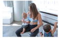 Women nursing her newborn