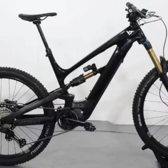 a black YT electric full suspension mountain bike