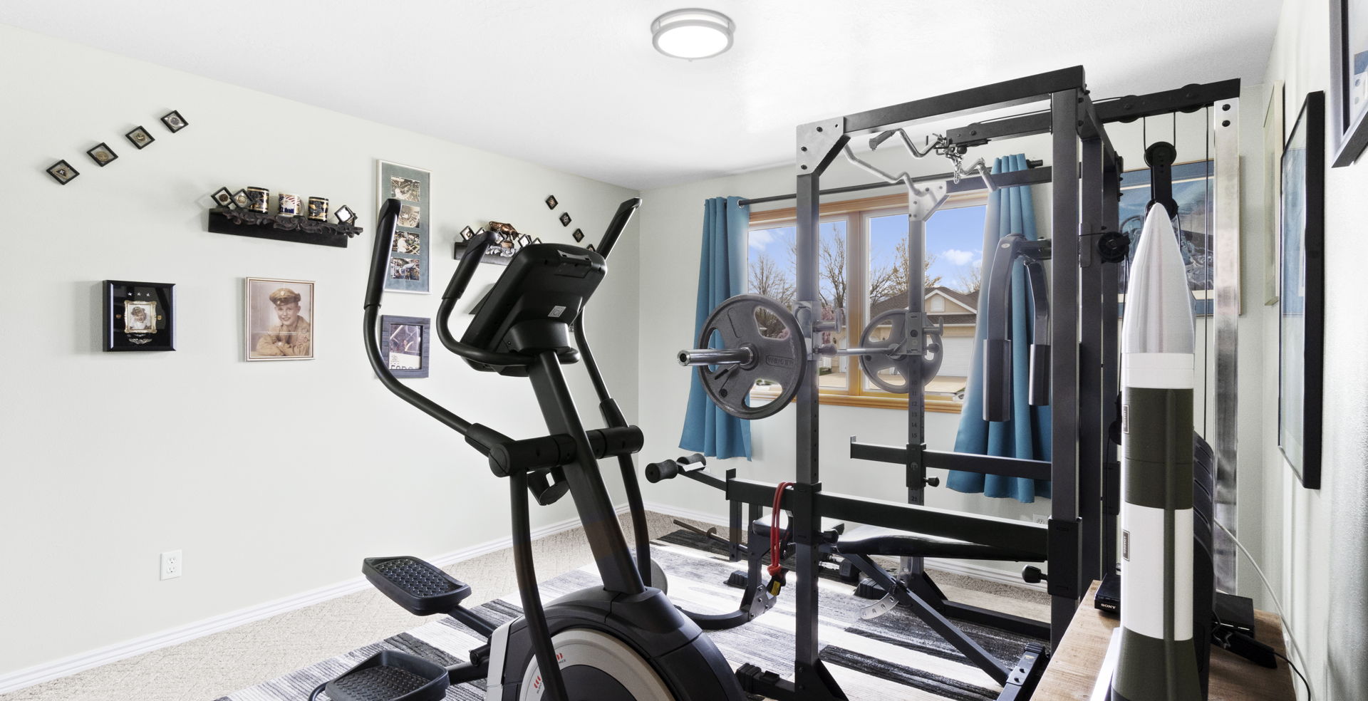 workout room featuring natural light