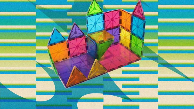 Multicolor geometric pieces connected to partially create a house