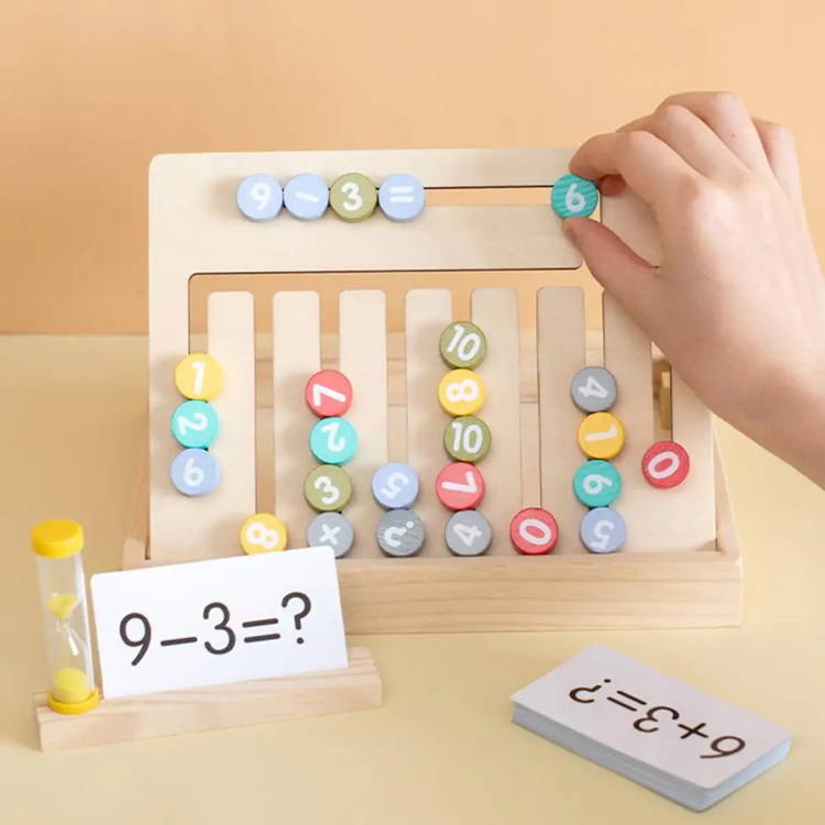 Hand moving a wooden peg with a number six on it to complete a task on a wooden Montessori maze toy.