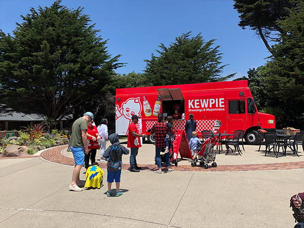 Parents and children at the food truck