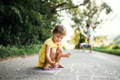 Children playing hopscotch.