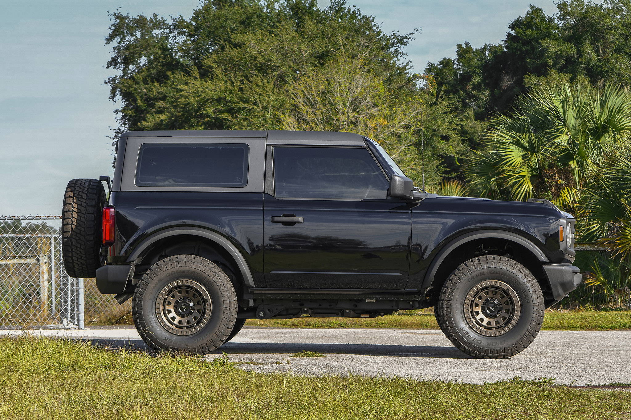 2019 Magnetic Grey Toyota 4-Runner Lifted with the HD Off-Road Overland Sector Venture Wheels in 17x9.0 in All Satin Black