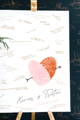wedding guest book alternative canvas with fingerprint heart and guest signatures on easel