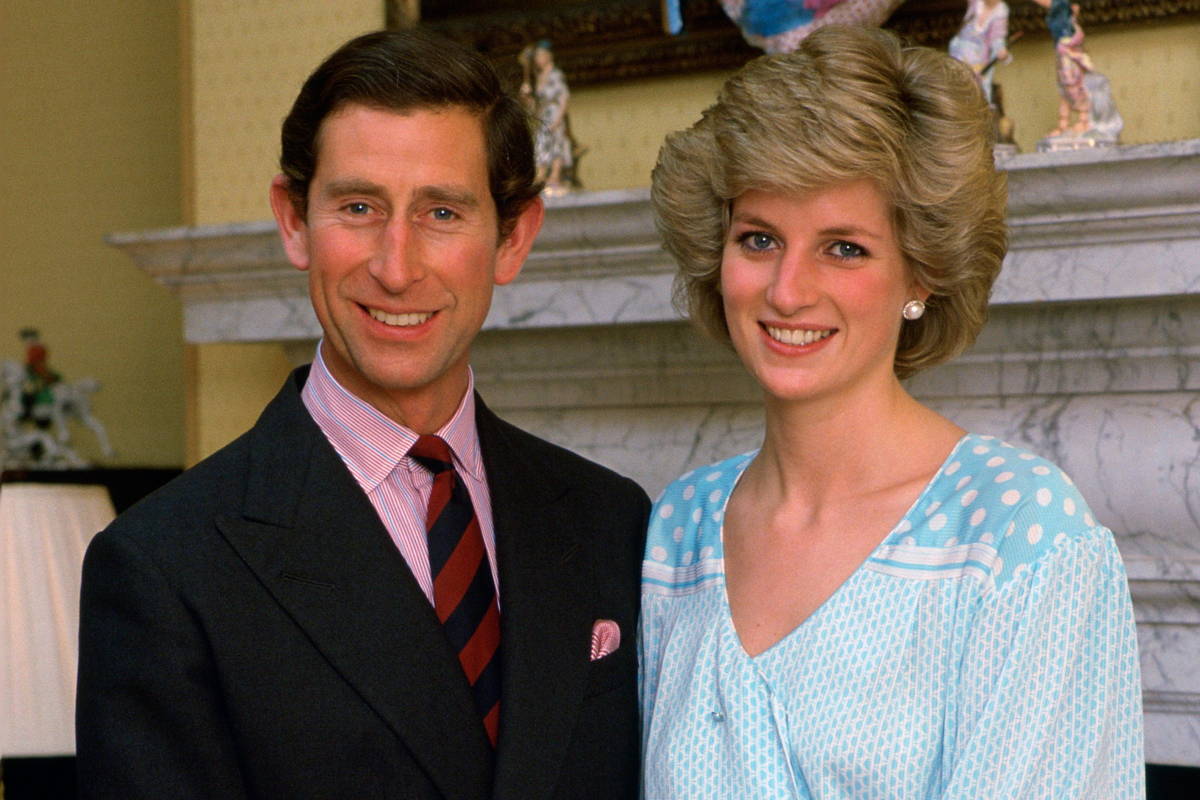 Image may contain: Charles, Prince of Wales, Diana, Princess of Wales, Person, Clothing, Formal Wear, Suit, Face, and Head