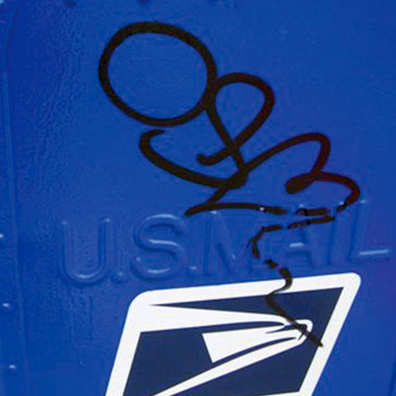 removing graffiti from us mail box using graffiti safewipes graffiti remover