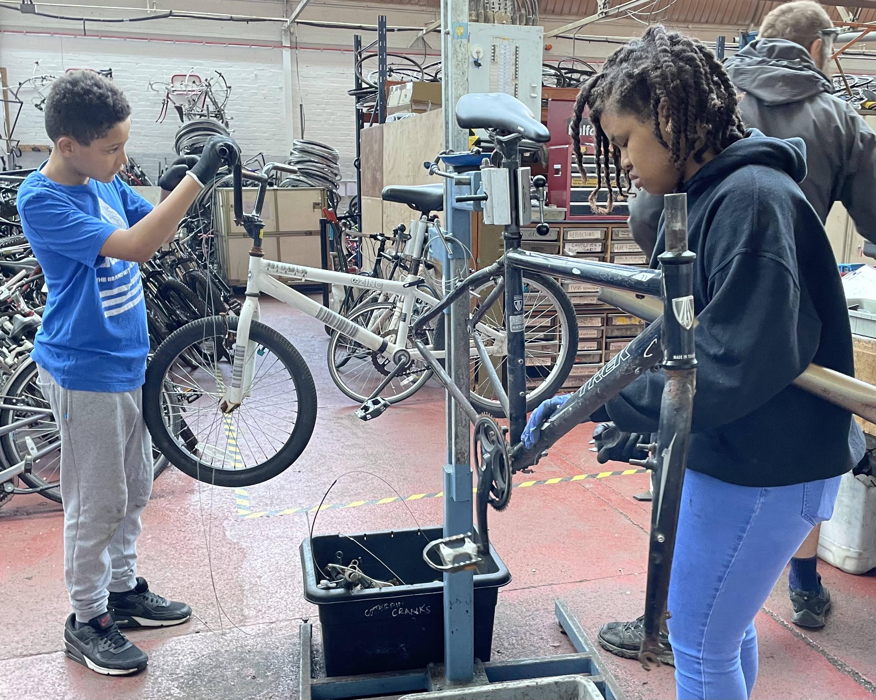 Young volunteers in a Recyke Y'Bike workshop