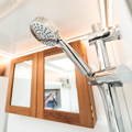 GXV EPIC bathroom medicine cabinet and shower head