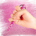 hand holding pink camouflage kubaton hand holding pink camouflage kubaton