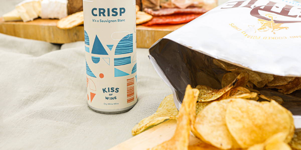 Salt and vinegar crisps opened at a picnic paired with Kiss of Wine light Sauvignon Blanc.