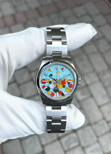 Rolex Oyster Perpetual 31 Turquoise Celebration Dial