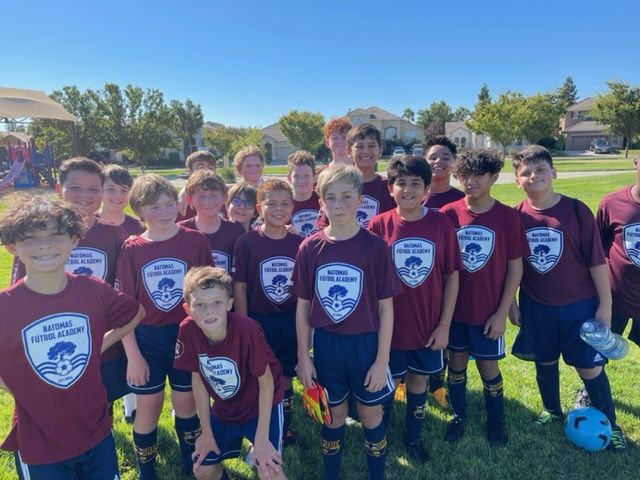 Maroon Uniform Soccer Team Photo