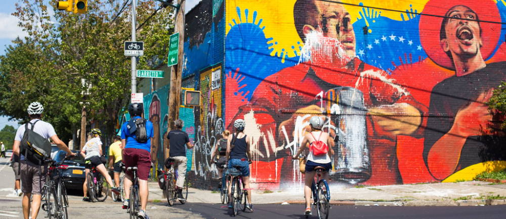 Cyclists riding together on street