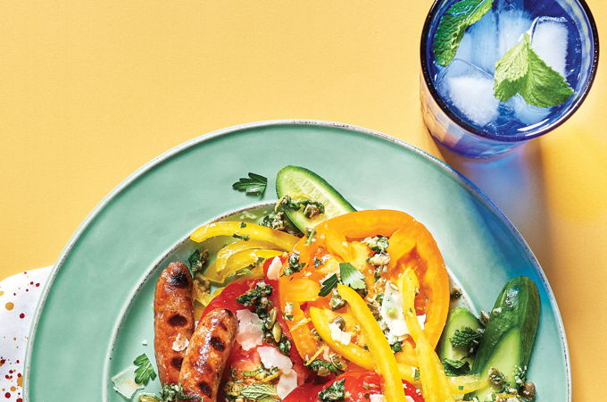 Merguez grillées et tomates aux herbes