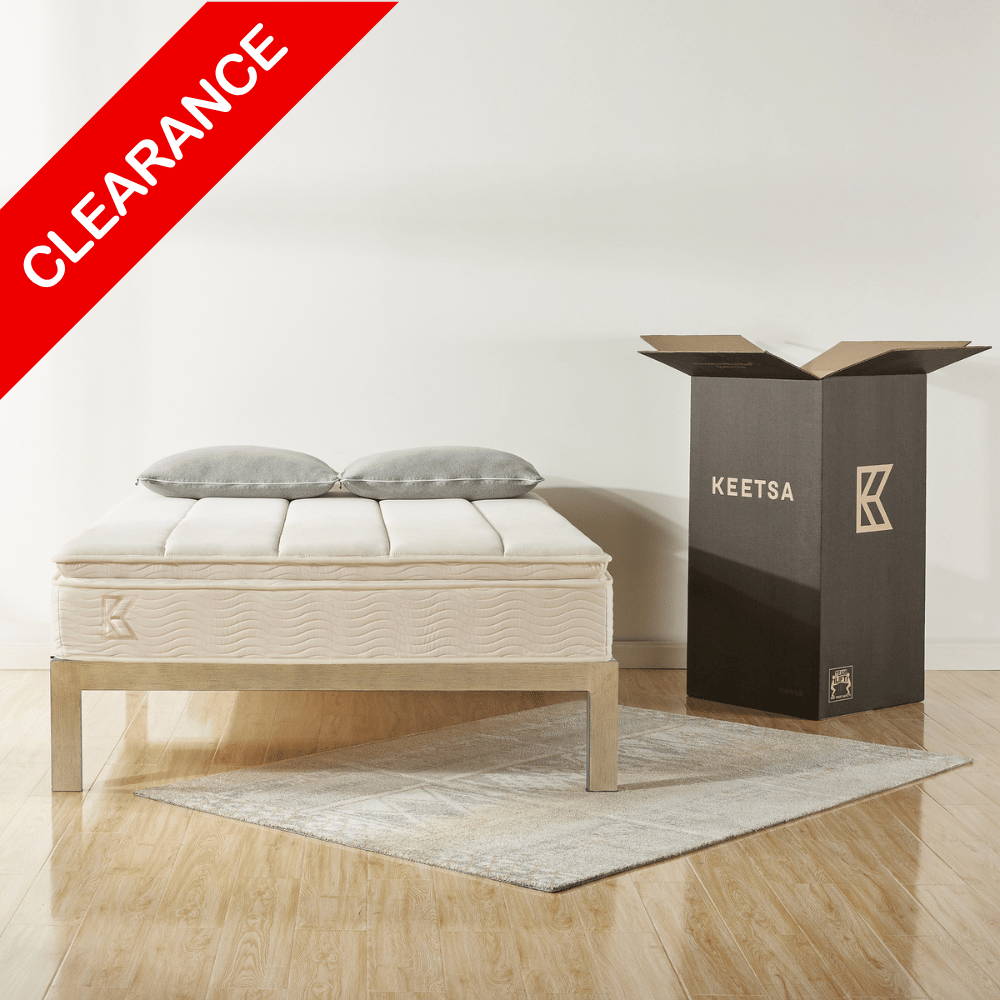 Dog sitting on Keetsa Pet Bed