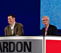 Derek Bruton and Andy Kalbaugh reprise their well-received 'Pardon the Optimism' riff from last year's conference.