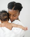 Breathtaking Motherhood Session: Mother Holding Baby