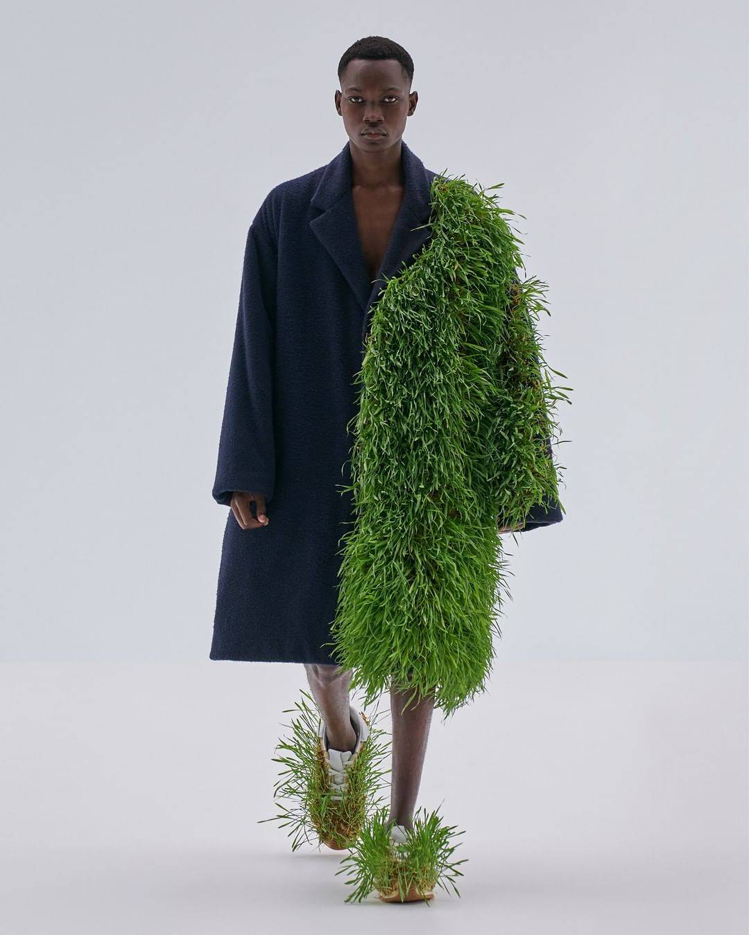 Jonathan Anderson, the creative director for Loewe, designed a collection that fuses technology and nature, showcasing garments that feature living plants