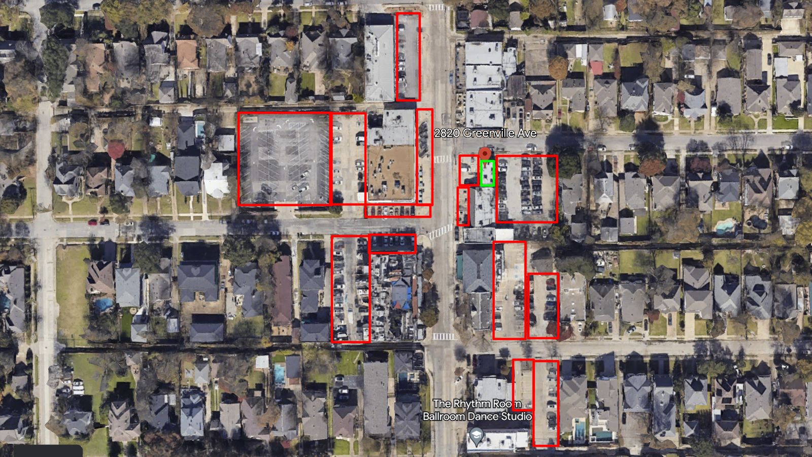 Satellite view of Val's Cheesecake (in green square) on Greenville Ave. Parking lots in red squares.