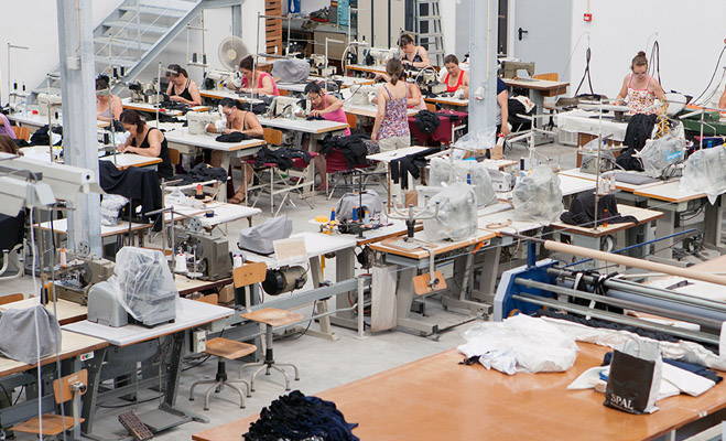 Working women in textile atelier LaGofra producing organic clothing for Organique