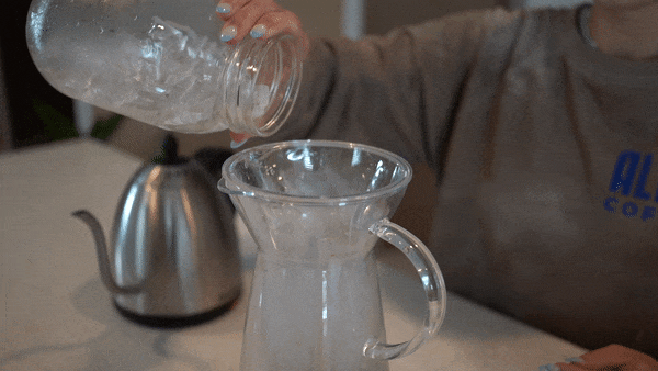 Ice pouring into coffee carafe 