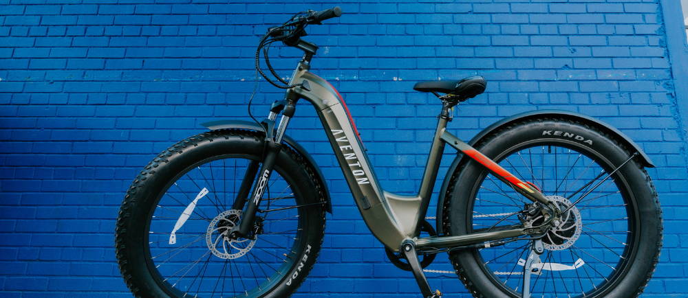 a green Aventon Aventure elctric fat tire bike