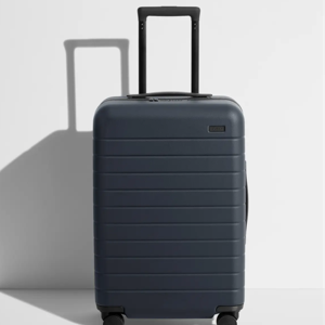 Shop The Bigger Carry-On suitcase | Away: Built for modern travel - Navy Blue
