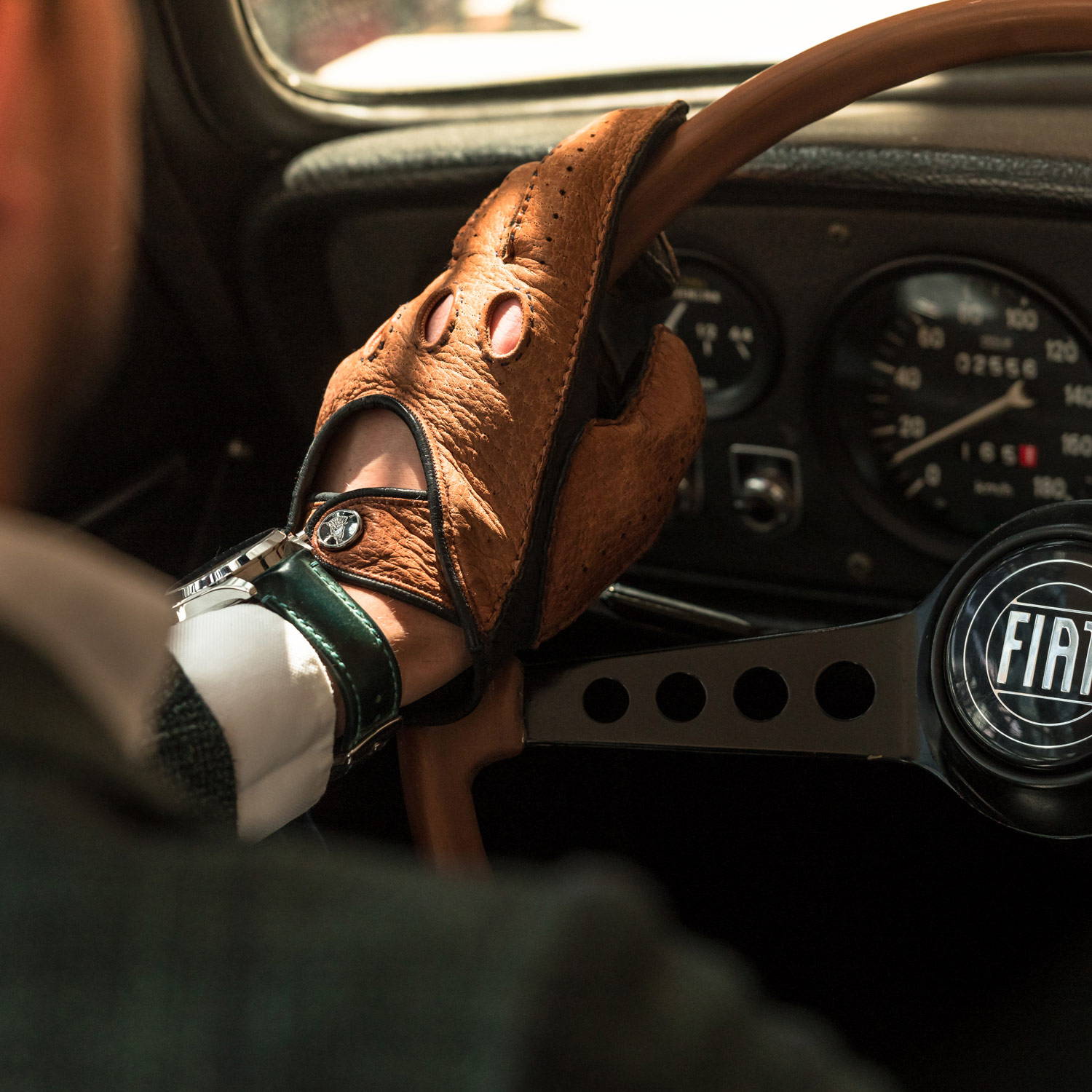 Brown leather driving gloves